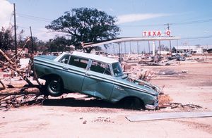 Hurricane Camille Damage - Rambler American in front of Texaco