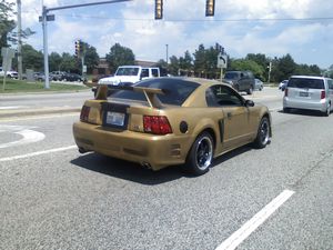 Modified Gold Ford Mustang
