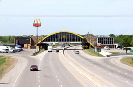 Photo of Glass House Restaurant which spans the Will Rogers Turnpike, Interstate 44, in Oklahoma. Photo courtesy of Oklahoma Turnpike Authority.