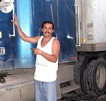 Luis next to his truck