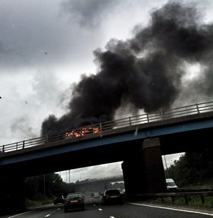 VW camper is on fire on a bridge over the M6
