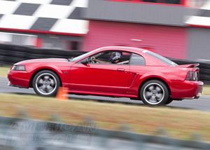 AmericanMuscle New Edge Ford Mustang 2000 Mustang at the Track