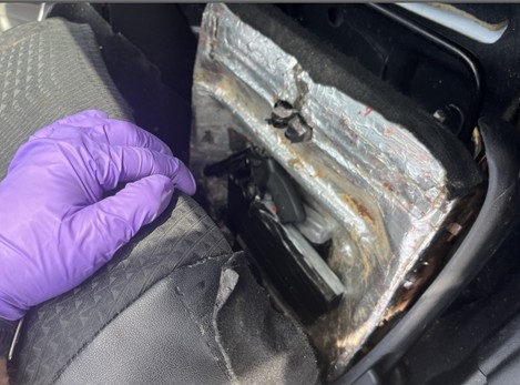 fentanyl and handgun in hidden compartment