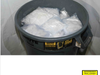 A photo used as evidence at trial of methamphetamine piled into a trash can. 