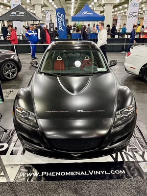 2004 Mazda RX-8 with flat black vinyl wrap by Phenomenal Vinyl